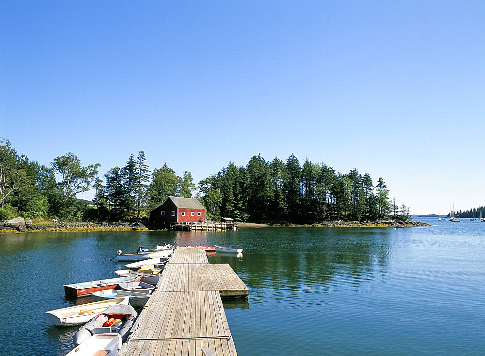 Old wood pier and boats in the harbour, South Brooksville, Maine, New England, United States of America, North America