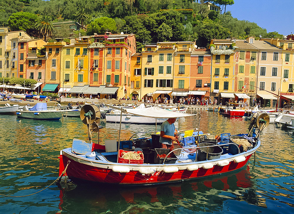 Old buildings and boats in the harbour at Portofino, Liguria, Italy