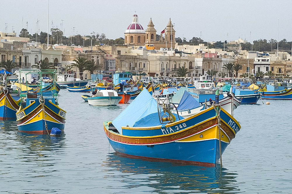 Colourful boats in the harbour of Marsaxlokk, Malta, Mediterranean, Europe