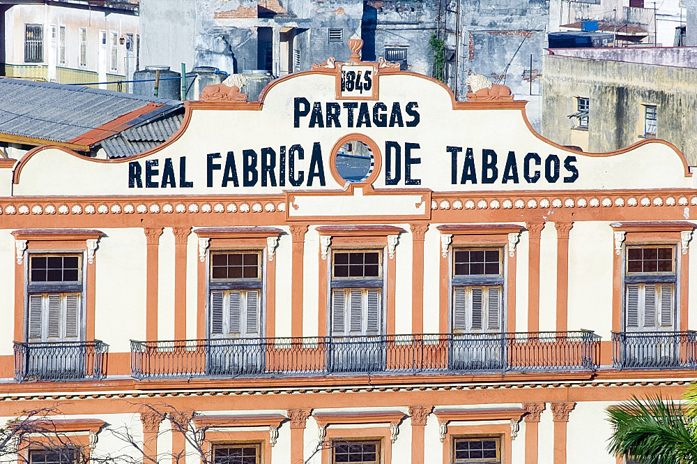 A building housing a cigar factory in central Havana, Cuba, West Indies, Central America