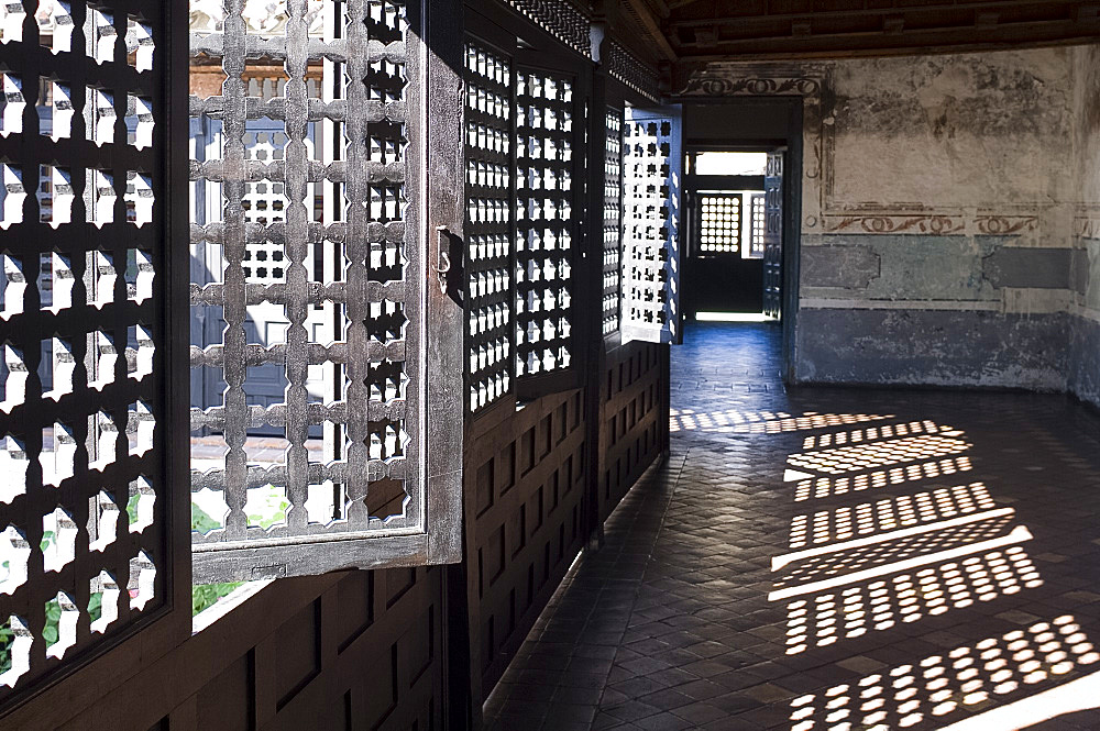 Moorish style wooden screens surrounding a courtyard at the Casa de Diego Velazquez (Museo de Ambiente Historico Cubano), Santiago de Cuba, Cuba, West Indies, Central America