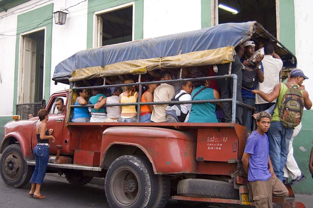 Old truck transporting passengers, Havana, Cuba, West Indies, Central America