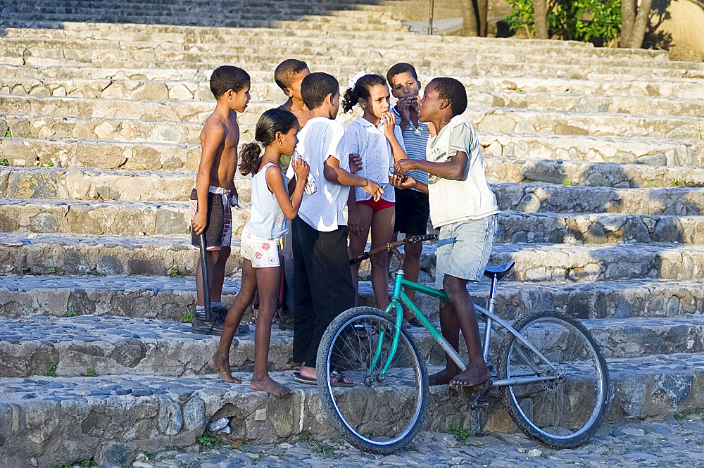 A group of children on stone steps in Trinidad, Cuba,West Indies, Central America