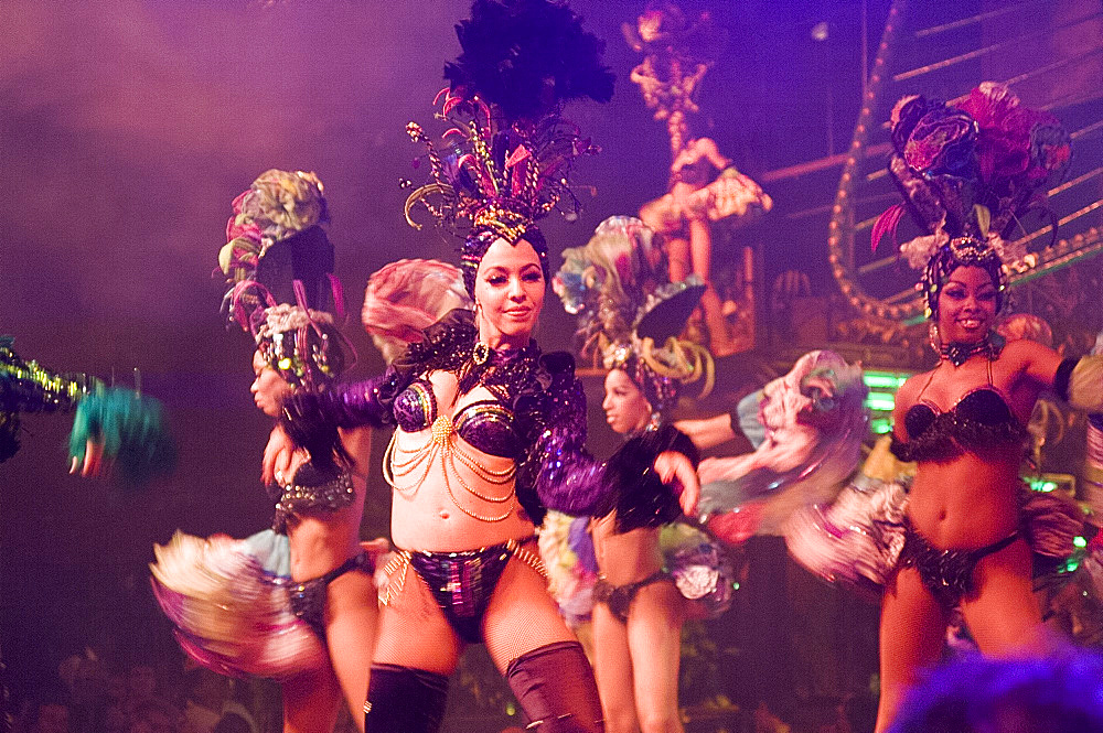 Scantily clad ladies dancing at the Tropicana nightclub, Havana, Cuba, West Indies, Central America