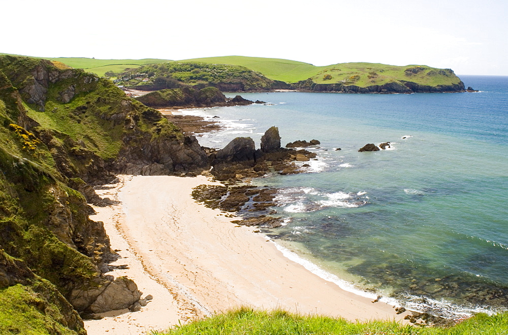 A small sandy beach near Woolman Point and Hope Cove, south Devon, England, United Kingdom, Europe