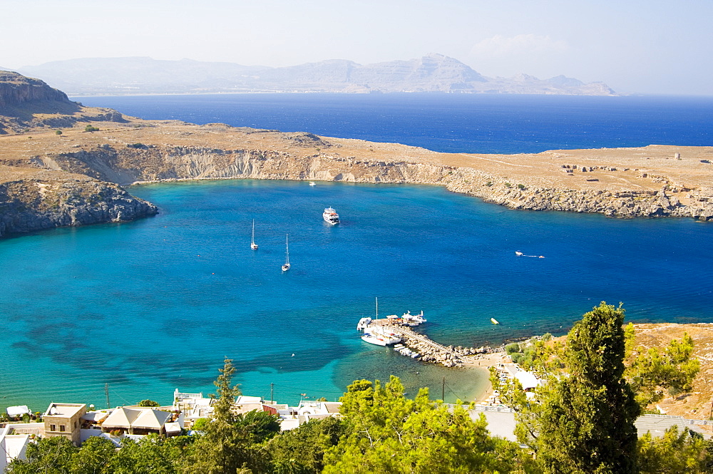 An aerial view of Lindos Bay, Lindos, Rhodes, Dodecanese Islands, Greek Islands, Greece, Europe