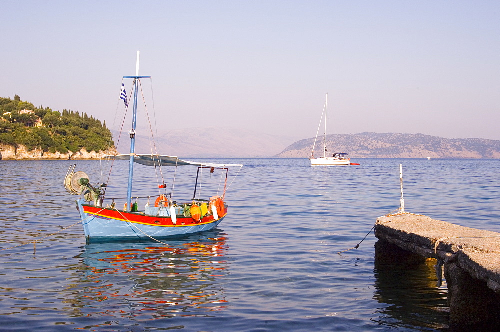 Colourful old wooden fishing boat in Kalami on the northeast coast, Corfu, Ionian Islands, Greek Islands, Greece, Europe