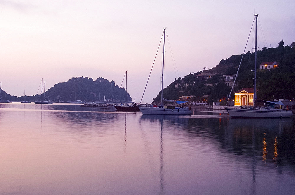 The harbour at Lakka at dusk, Paxos, Ionian Islands, Greek Islands, Greece, Europe