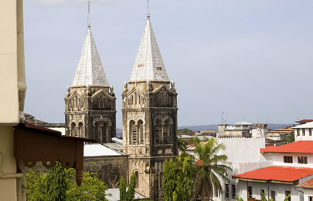 A view of the Stone Town skyline including the twin spires of St. Joseph's Catholic Cathedral, Stone Town, UNESCO World Heritage Site, Zanzibar, Tanzania, East Africa, Africa