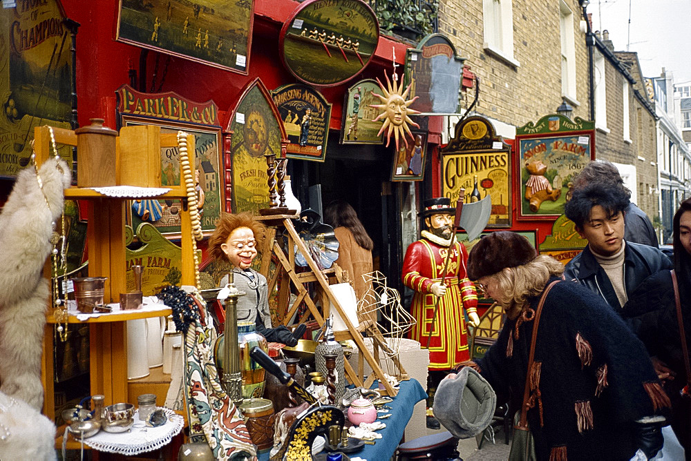 Assorted antiques displayed outside shop, Portobello Market, London, England, United Kingdom, Europe