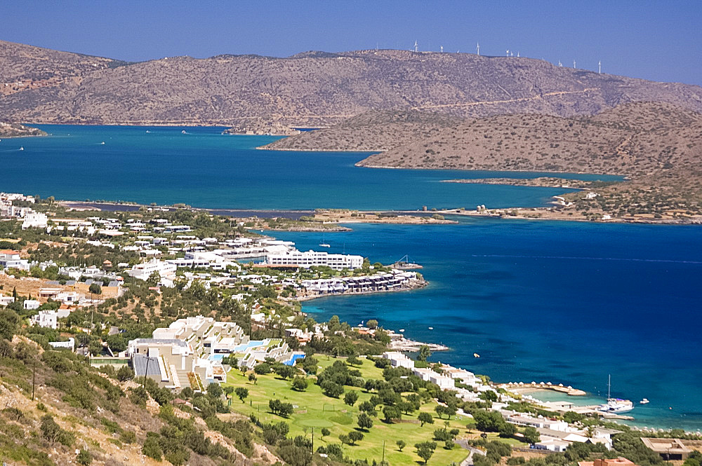 An aerial view of the coast around the resort of Elounda, Crete, Greek Islands, Greece, Europe