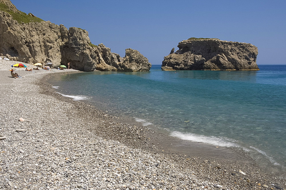 The pebble beach and emerald seas at Sougia on the south coast of Crete, Greek Islands, Greece, Europe