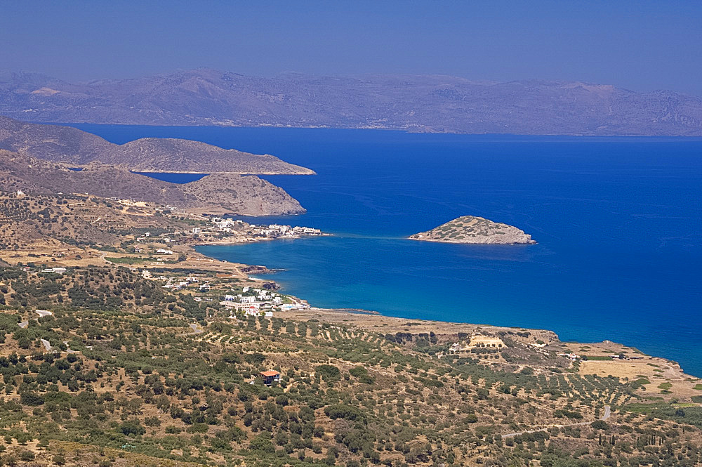 A view of the coastline from Mirsini toward Mohlos on the road to Sitia on the north coast of Crete, Greek Islands, Greece, Europe