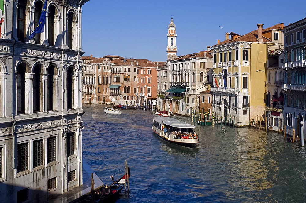 A view of the Grand Canal from the Rialto Bridge with Palazzo Camerlengha on the left and Chiesa dei SS Apostoli, Venice, UNESCO World Heritage Site, Veneto, Italy, Europe