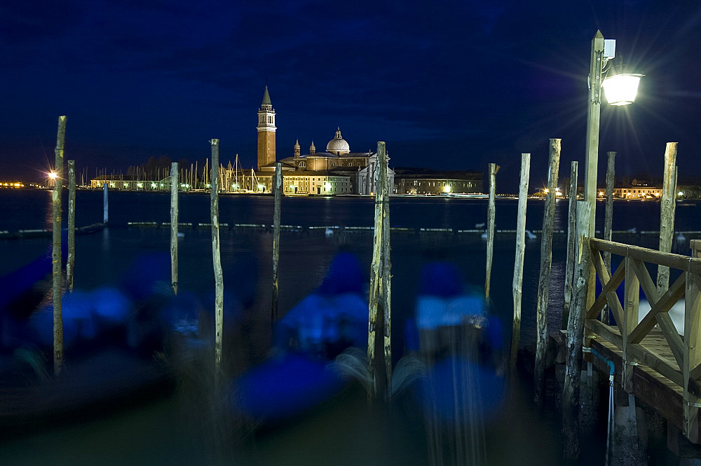 Gondolas at dusk on the Venice Lagoon and San Giorgio di Maggiore behind, Venice, UNESCO World Heritage Site, Veneto, Italy, Europe