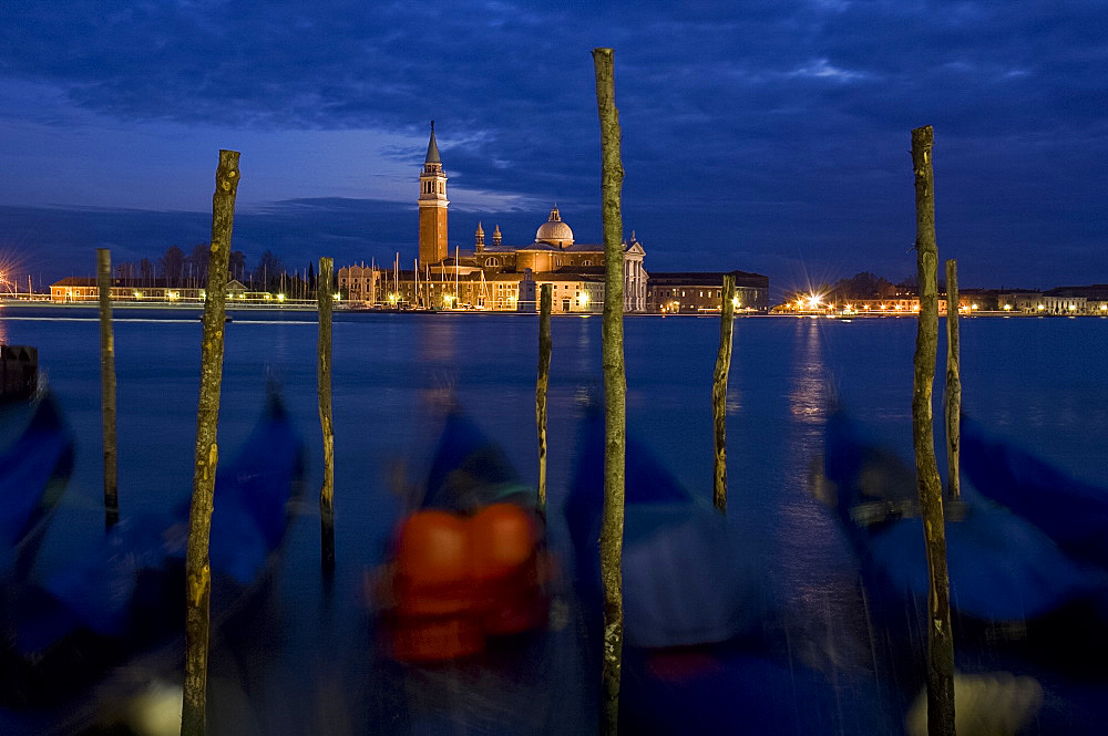 Gondolas at dusk on the Venice Lagoon and San Giorgio di Maggiore behind, Venice, UNESCO World Heritage Site, Veneto, Italy, Europe