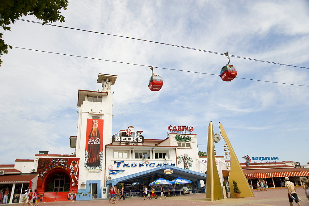 A cable car running above cafes in the Black Sea resort of Mamaia, Romania, Europe