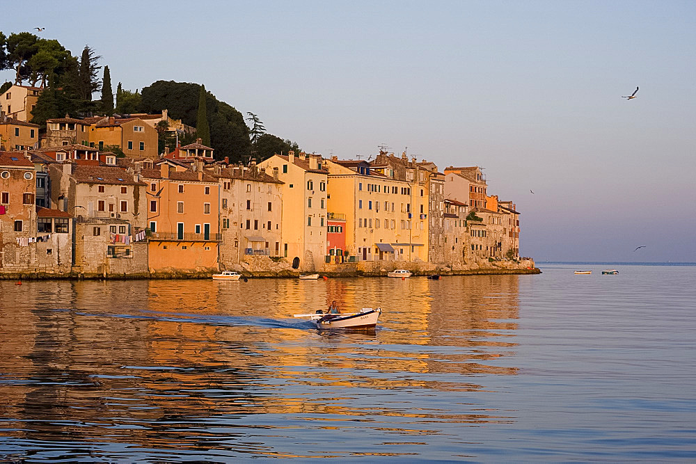 A small fishing boat at Rovinj at sunrise, Istria, Croatia, Adriatic, Europe