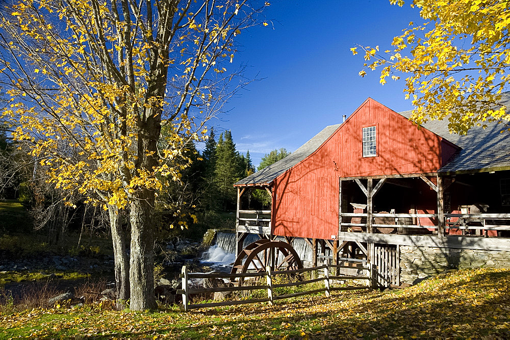 The old mill and waterfall surrounded by autumn leaves, Weston, Vermont, New England, United States of America, North America