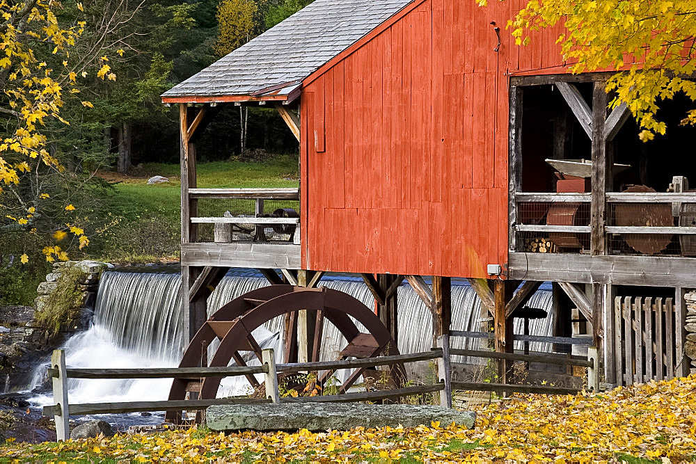 Autumn foliage around the old mill and waterfall in Weston, Vermont, New England, United States of America, North America