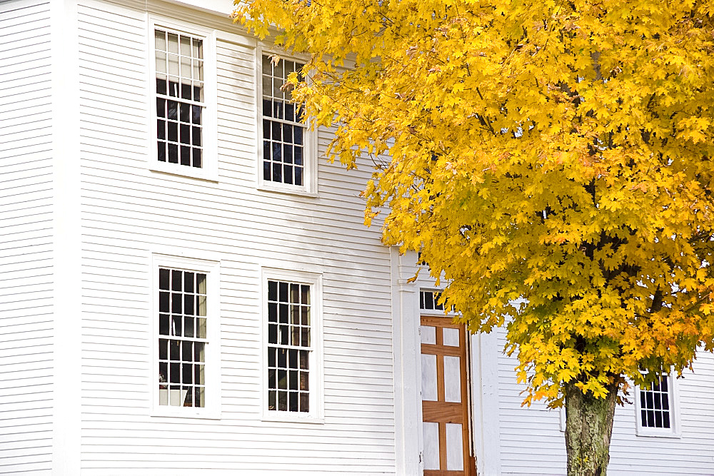 Autumn foliage next to the colonial style Weston Museum in Weston, Vermont, New England, United States of America, North America