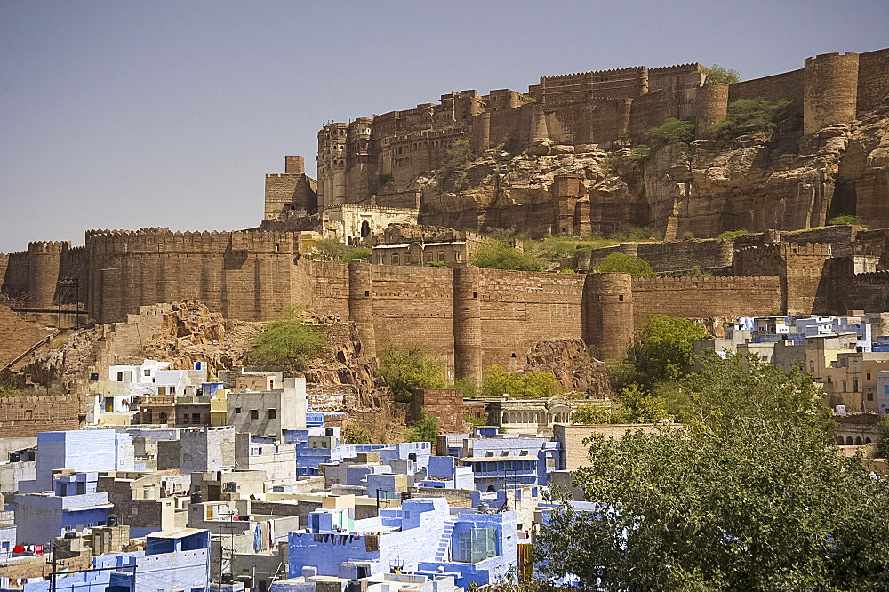 The Blue City overlooked by the hilltop Mehrangarh Fort, Jodhpur, Rajasthan, India, Asia