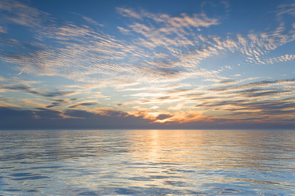 Sunset seen from a cruise ship on a calm evening