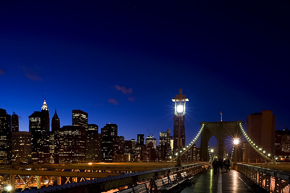 The Brooklyn Bridge and New York City skyline at dusk, New York City, New York State, United States of America, North America