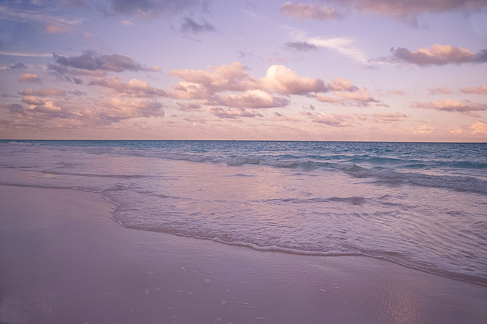 Clouds at sunset over Pink Sands Beach, Harbour Island, Eleuthera, The Bahamas, West Indies, Atlantic, Central America