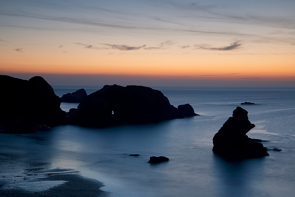 Sunset over unusual rock formations in Porthcothan Bay, Cornwall, England, United Kingdom, Europe