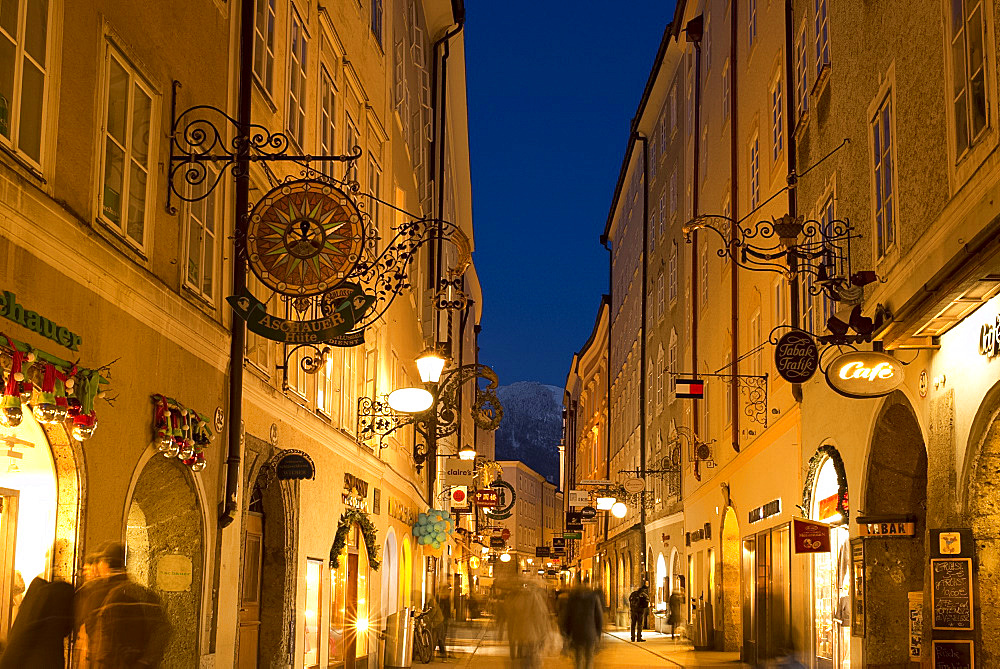 Traditional hanging signs along Getreidegasser, the main shopping street in the Altstadt, Salzburg, Austria, Europe