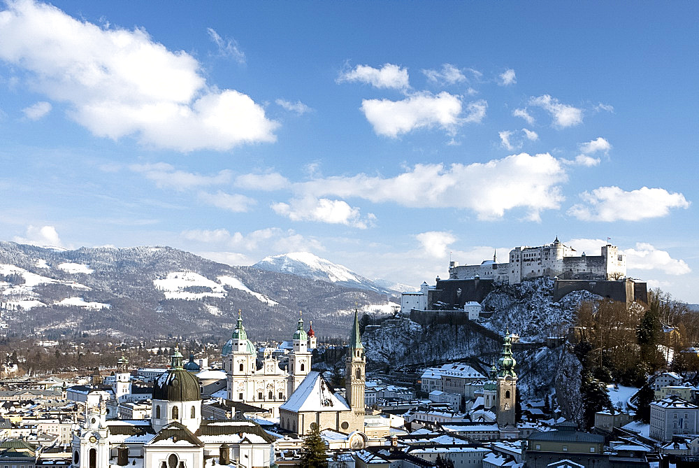 The Altstadt skyline including Salzburg Cathedral, Franziskaner Kirche and Fortress Hohensalzburg behind, Salzburg, Austria, Europe