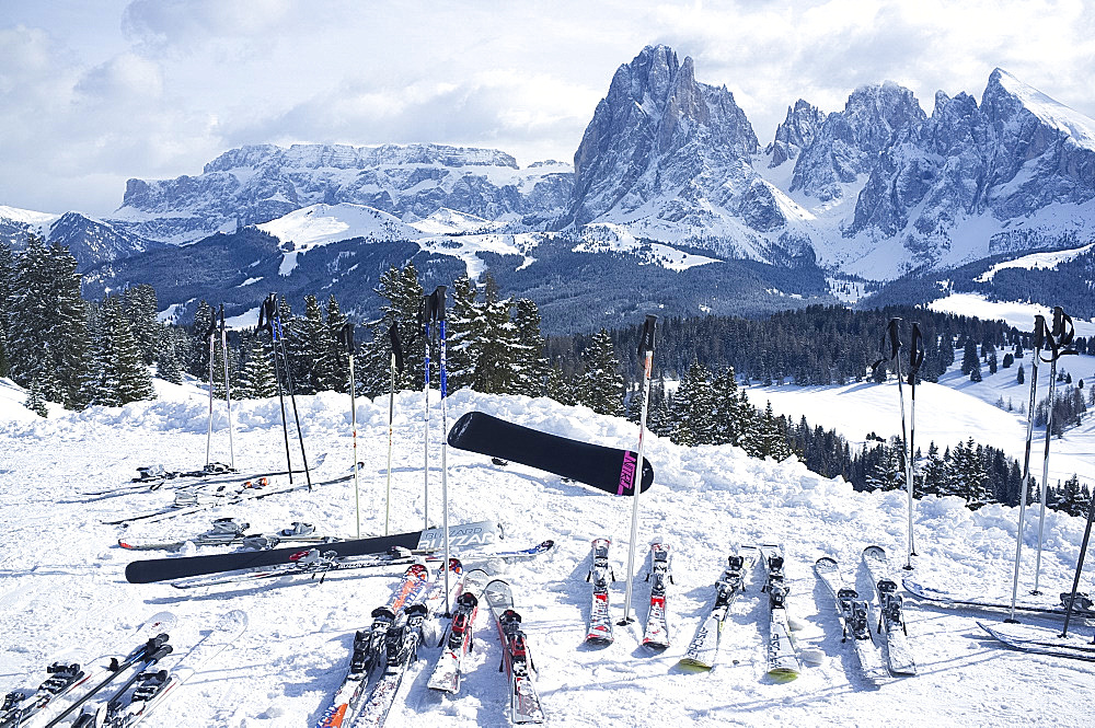 A snowy view of Sassolungo and Sassopiato Mountains behind the Alpe di Siusi ski resort in the Dolomites, South Tyrol, Italy, Europe