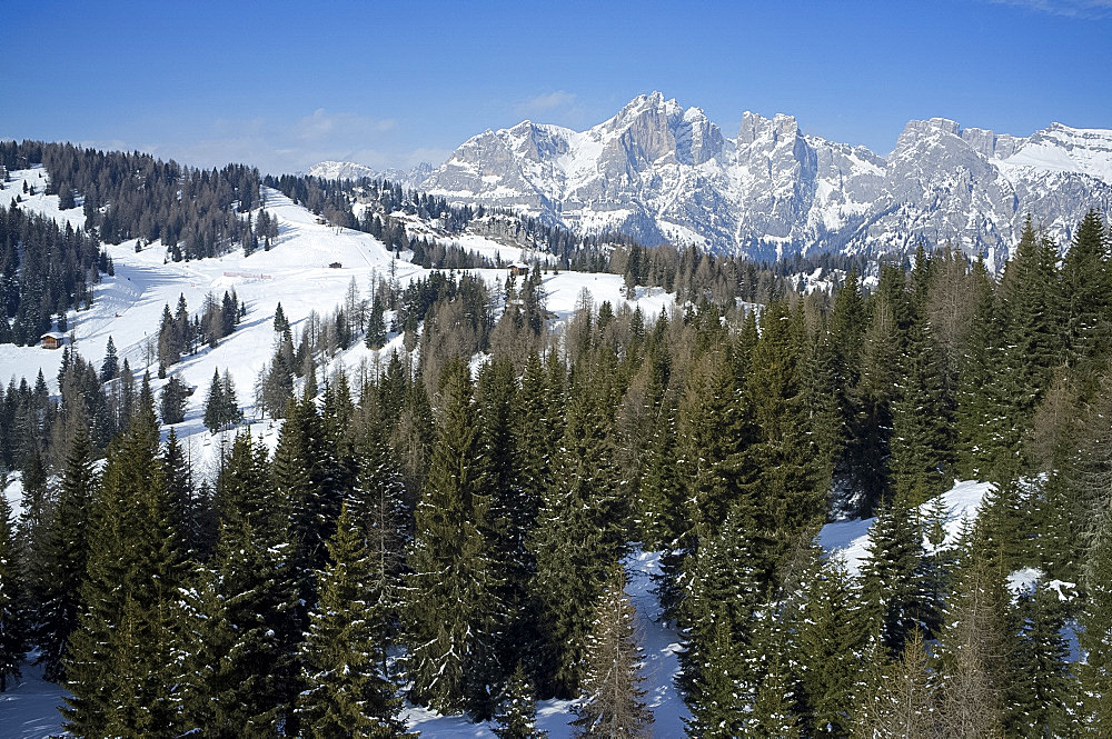 An aerial view of The Civetta ski resort and Civetta Mountain in the distance, The Dolomites, South Tyrol, Italy, Europe