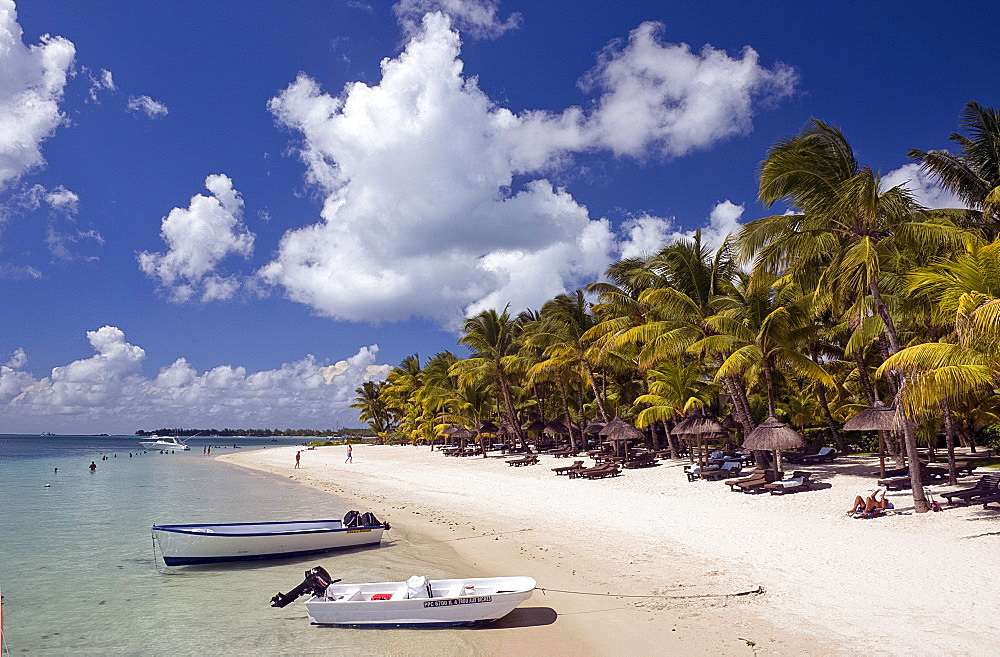 Boats on the beach at Trou aux Biches on the northwest coast of Mauritius, Indian Ocean, Africa