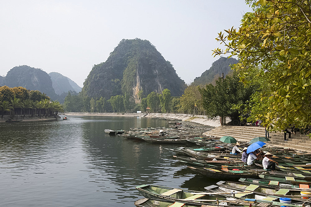 Row boats in Tam Coc used to take tourists around the Trang An Landscape Complex in Ninh Binh Province, Vietnam, Indochina, Southeast Asia, Asia