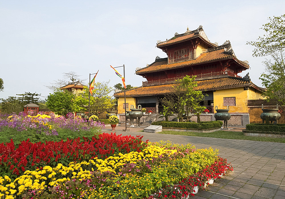 Multicoloured flowers to celebrate the Tet holiday at the Hien Lam Pavilion in the Imperial City, the Citadel, UNESCO World Heritage Site, Hue, Vietnam, Indochina, Southeast Asia, Asia