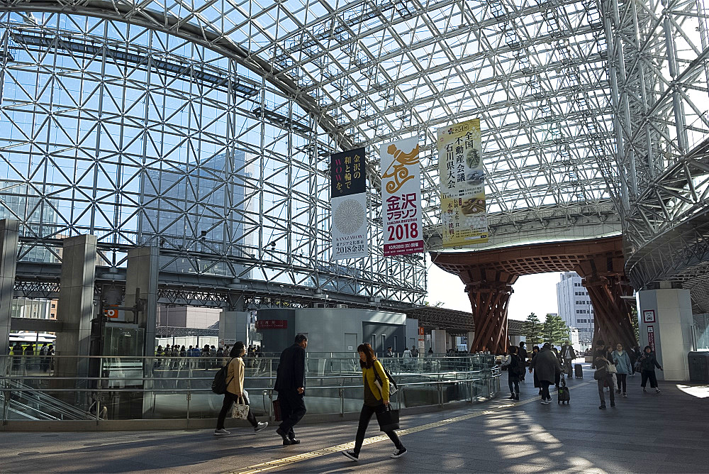 A wooden gate and steel and glass roof at the east entrance to the Kanazawa JR railway station, Kanazawa, Ishigawa, Japan, Asia