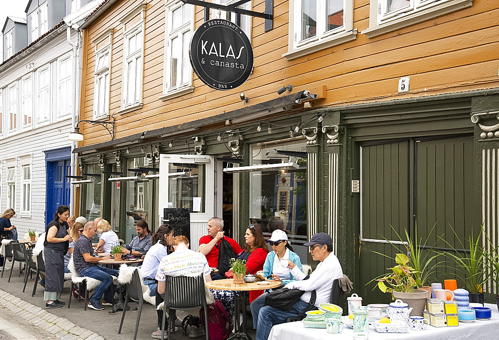 An outdoor cafe in the Mollenberg district of Trondheim, Trondelag, Norway, Scandinavia, Europe