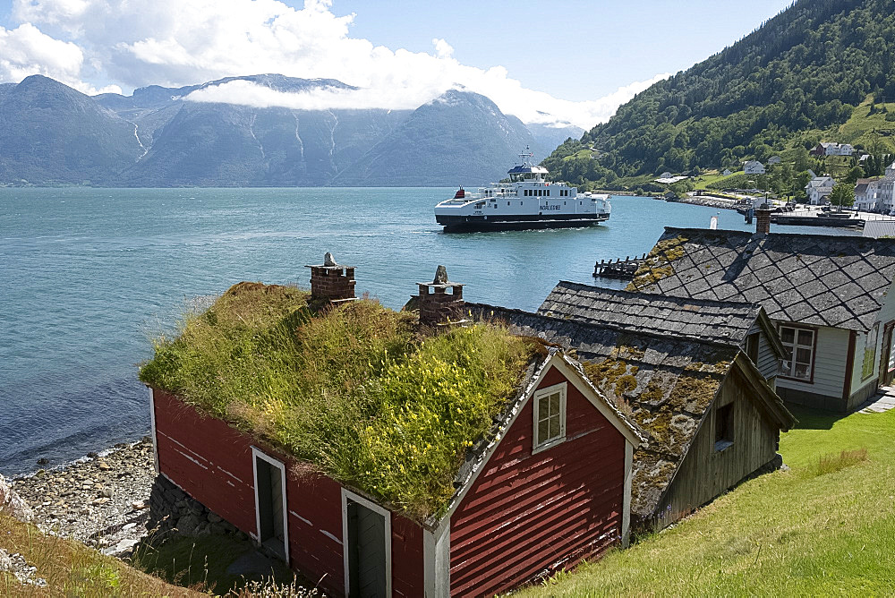 A ferry leaving the village of Utne on Hardanger Fjord, Vestlandet, Norway, Scandinavia, Europe