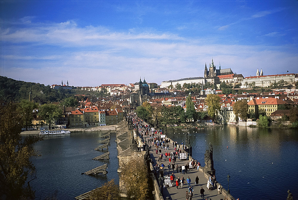 Charles Bridge over the River Vltava and city skyline, Prague, Czech Republic, Europe