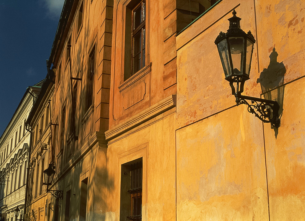 Close-up of street lamp on the wall of a house near the castle in Prague, Czech Republic, Europe