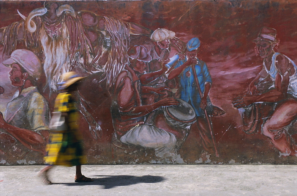 Woman walking in Anse La Raye, St. Lucia, Windward Islands, West Indies, Caribbean, Central America