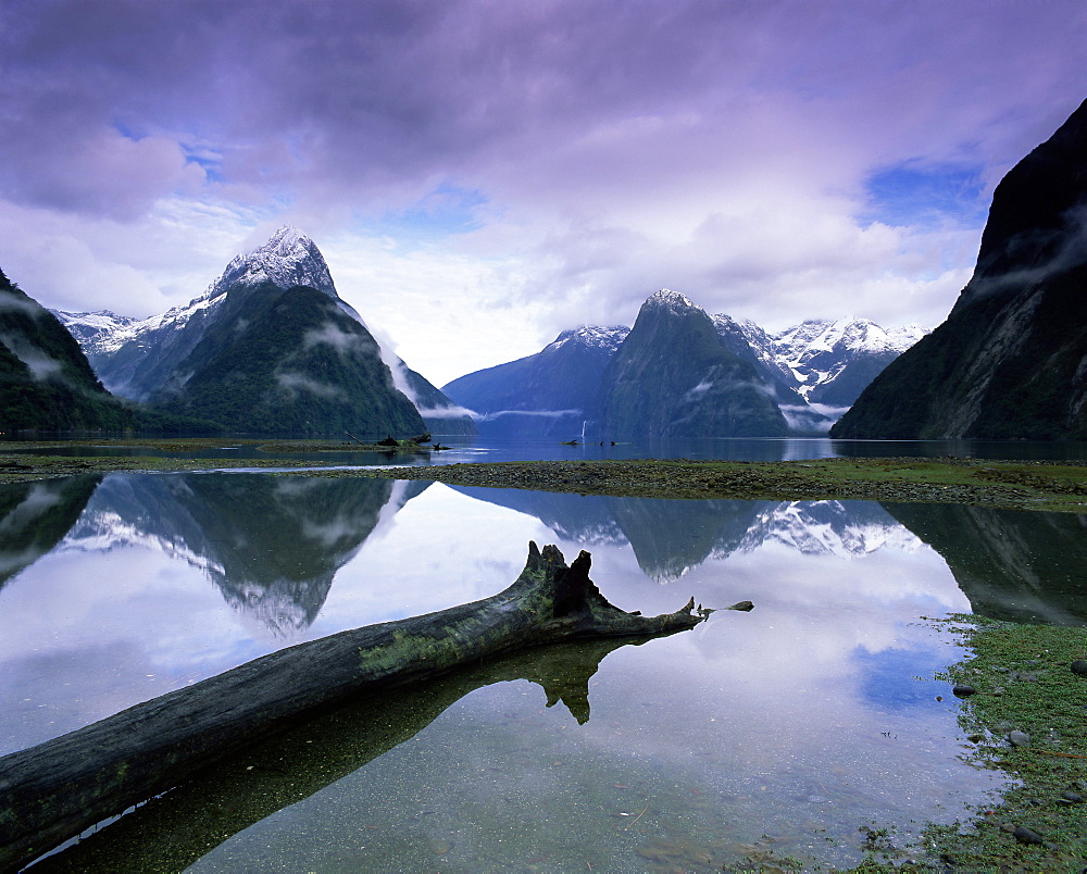 Reflections and view across Milford Sound to Mitre Peak, 1629m, Milford Sound, Fiordland, South Island, New Zealand, Pacific