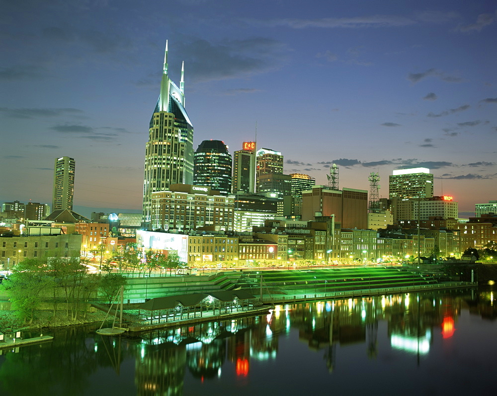 City skyline and Cumberland river at dusk, Riverfront Park, Nashville, Tennessee, United States of America, North America