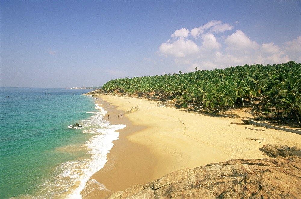 Beach and coconut palms, Kovalam, Kerala state, India, Asia