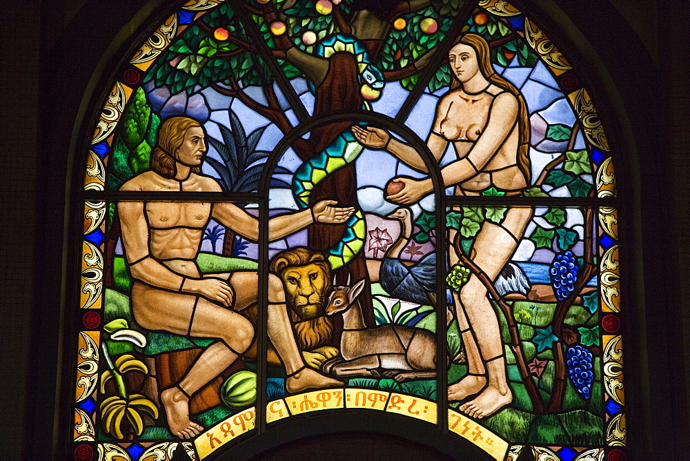 Stained glass window depicting Adam and Eve in the Garden of Eden, Holy Trinity Cathedral, the largest Orthodox church in the country, built between 1935 and 1942, Addis Ababa, Ethiopia, Africa