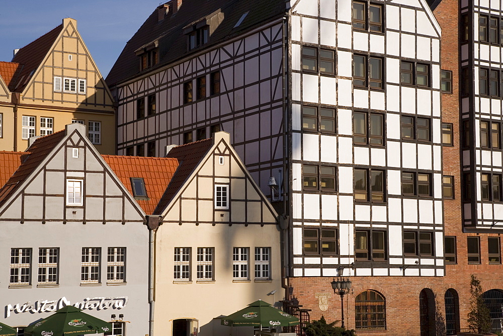 Restored warehouses along the Stara Motlawa river (Mottla River), Gdansk, Pomerania, Poland, Europe