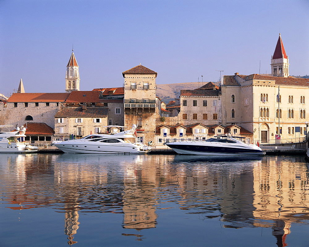 Boats moored in front of the Old Town, Trogir, UNESCO World Heritage Site, Dalmatia, Croatia, Europe