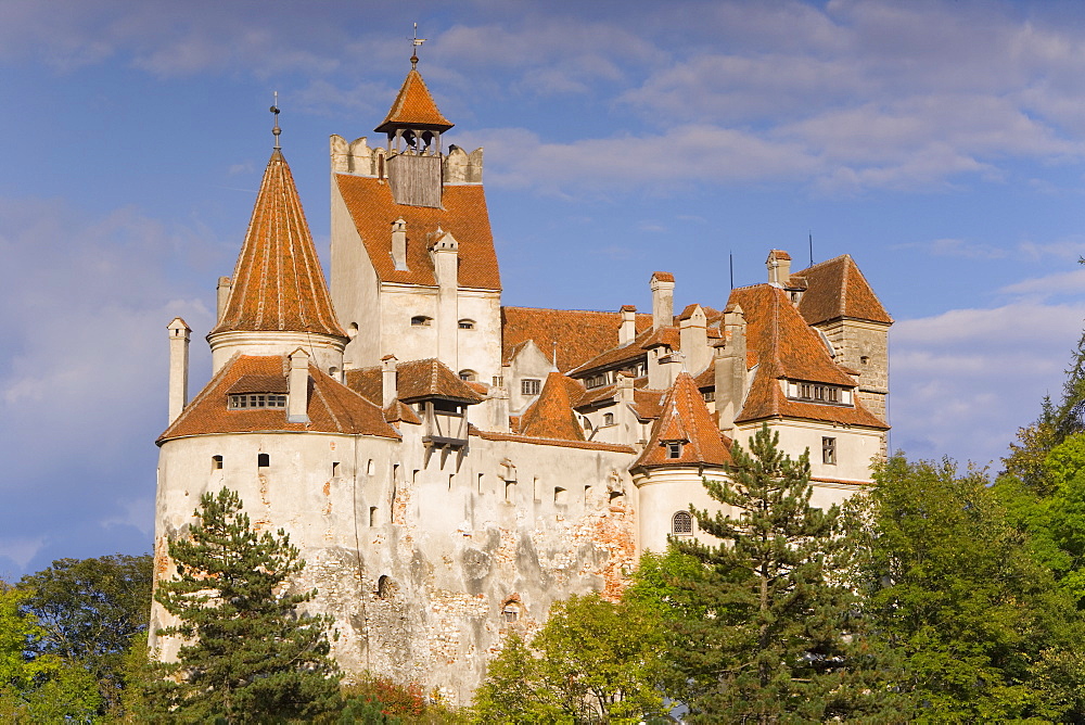 Bran Castle (Dracula's Castle) perched atop a 60m peak in the centre of the village, built by Saxons from Brasov in 1382, Bran, Prahova Valley, Saxon Land, Transylvania, Romania, Europe